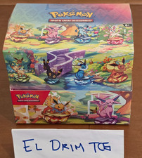 Pokemon TCG: Prismatic Evolutions Mini Tin Display sealed (8 mini tins) SPANISH picture
