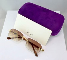 Gucci GG1221S 004 56mm Square Rimless Sunglasses Gold with Brown Logo  Lens picture