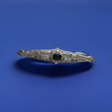 Filigree Brooch in 14k white gold with a 1.13ct Sapphire and 2 .06ct diamonds picture