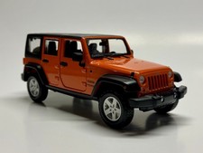 Orange 1/24 2015 Jeep Wrangler Die-cast Car By Maisto picture