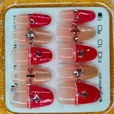 SkyMarie Handmade Large Red & Rose Gold French Tip Press-On Nails with Stars picture