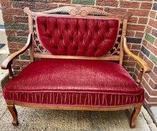 Antique Victorian-Style Carved Wood Scrollwork Settee Red Velvet Button Tufted picture