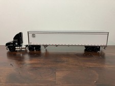 DCP First Gear 1/64th  Spee Dee Delivery Mack Pinnacle and 53' Dry Van picture