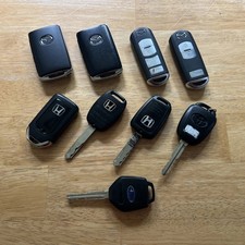Wholesale Lot of 9 OEM Keyless Entry Remotes Mazda Honda Toyota Subaru GUC picture