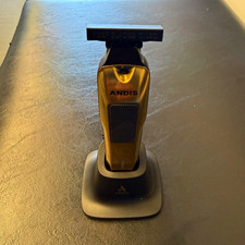 Andis Phenom Cordless Rechargeable T-Blade Trimmer Hair/Beard Gold/Black Stand picture