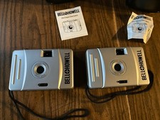 2 Bell & Howell 35mm Vtg Ultra Compact Cameras Focus Free w Cases Mint UNTESTED picture