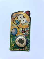 Original RakuRaku DinoKun white Dinkie Dino Electronic Virtual Pet TK-910  NEW picture