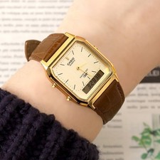 CASIO AQ-230EGL-9ADF Retro Digital Watch ORIGINAL New Gold Brown picture