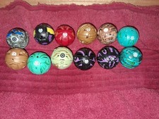 Vntg Bakugan Battle Brawlers Lot Of 12 Balls Figures Gen 1 Mixed Attributes picture