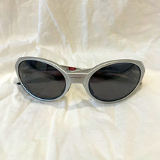 Oakley Eye Jacket Redux in a silver frame with dark lenses picture