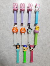 Eleven (11) Vintage Pez Dispensers Easter Halloween Jasmine Minnie Tweety picture
