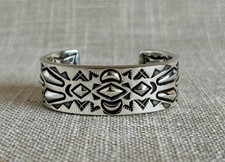 Rudy Willie sterling silver stamped cuff bracelet native american artist signed picture