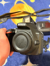 Nikon D3500 DSLR Bundle w/ AF-S DX 35mm f/1.8G Lens, TT560 Flash, HB-46 picture