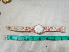 Swatch Women’s Floral Analog Quartz Watch Arabic Numerals Seconds picture