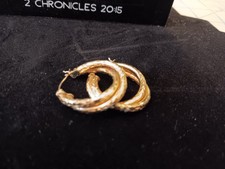 14kt gold double hoop textured earrings in good condition 1 inch round picture