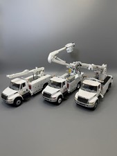 Lot of 3 First Gear Altec International DuraStar 1:34 Diecast Utility Trucks picture