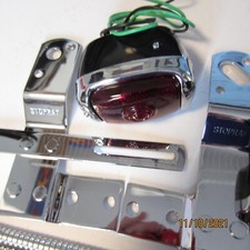 1940-53 Chevy truck chrome taillight brackets, black left & right pair 12 volt. picture