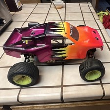 Vintage Team Losi 1:10 Electric 2WD Brushed Stadium Truck Purple/Orange picture