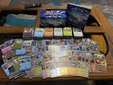 Pokemon Chaos Rising Bulk. Around 700 Cards. No Energy Cards. Players Guide Book picture