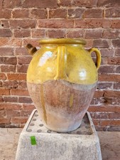 French 19th Century terracotta Confit jug with ochre-yellow glaze, H39cm picture