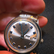 Timex Vintage Men’s Day/Date Water Resistant Silver Dial Metal Bracelet Watch picture