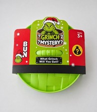 Grinch Mystery Glitter Dumpling Squishy Toy with Green Case – 1 Random Style picture