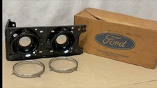 NOS 1974-76 MERCURY COUGAR RH PASSENGER SIDE HEADLIGHT MOUNTING ASSEMBLY picture