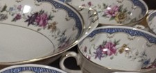 Coronado H&C China made in Bohemia 102 piece set. Gold trim with flowers.  picture