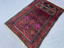 2x3 Vintage Baluchi Wool Rug with Repeating Tribal Panels and Layered Geometric picture