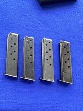 NEW  (4) Vintage Smith  Wesson Mod 39 Magazines 9mm 8 Rnd Blued Steel X Follower picture