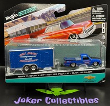 Maisto Design Tow & Go 1993 Chevrolet 454 SS Pick-Up & Car Trailer Blue picture