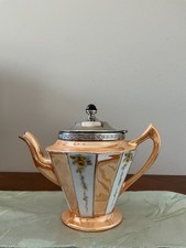Royal Rochester vintage peach lustreware teapot with a metal lid and floral pane picture