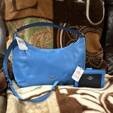 Blue coach bag with wallet picture