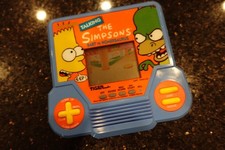 Vintage THE SIMPSONS   TIGER Handheld Electronic Tabletop Video game D8 TALKING picture