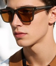 PRADA SPRA17SF Unisex Sunglasses Transparent Grey‑Green Frame Orange Lens 55MM picture