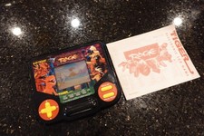 Vintage PRIMAL RAGE   by  TIGER Handheld Electronic LCD  Video game D7 picture