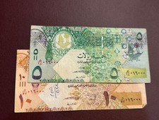 state of Qatar both with serial NO 016000 / normal condition picture
