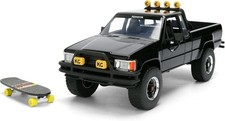 1985 TOYOTA SR5 PICKUP BLACK W/SKATEBOARD 
