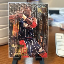 1996-97 Fleer Metal - Metal Shredders Hakeem Olajuwon #142 picture