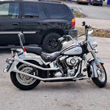 Fishtail Upsweeps for 86-17 Narrow Tire Harley Softail Exhaust Pipes Upgrading picture