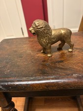 antique metal bank-lion, tail to the right - AC Williams, 1905-31 picture