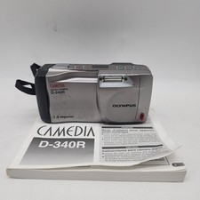 Silver Olympus Camedia LCD Digital Camera D-340R 1.3 Megapixel.....           77 picture