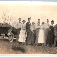 c1910s Group of Couples posing with Touring Car Antique RPPC Postcard picture