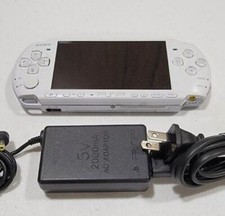 Official Sony White PSP 3000 with upgraded battery and charger picture