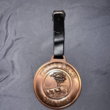 PEBBLE BEACH GOLF BAG TAG 1919  resort spyglass metal round usa picture