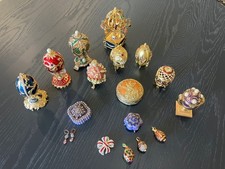 joan rivers collections of eggs,  pill boxes, pendants, brooch and earrings picture