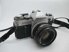 Canon AE-1 35mm SLR Film Camera with Canon 50mm f/1.8 FD Lens - WORKING PERFECT picture