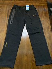 Nike NOCTA Tech Men's Fleece Sweatpants Black/Gold M FD8461-010 picture
