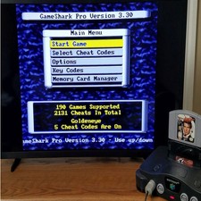 GameShark Pro V3.3 InterAct Nintendo 64 N64 Cheat Codes Cartridge Tested + BOOK picture