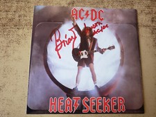 HAND SIGNED BRIAN JOHNSON  1980s EXCELLENT AC/DC Heatseeker/GO ZONE SLEEVE  45 picture